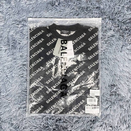 Balenciaga Mini Allover Logo Sweater in Black