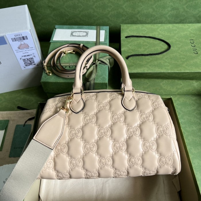 Gucci GG matelassé leather top handle bag beige ý702242