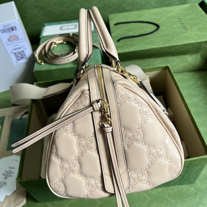 Gucci GG matelassé leather top handle bag beige ý702242