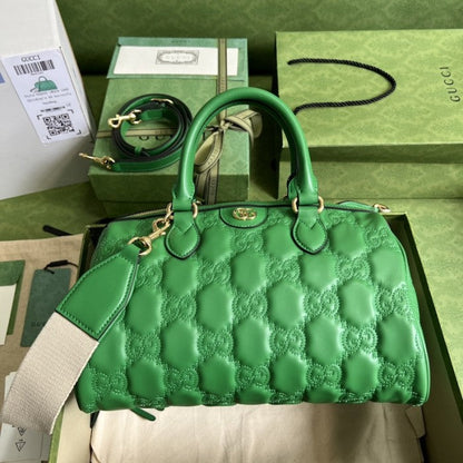 Gucci GG matelassé leather top handle bag green ý702242