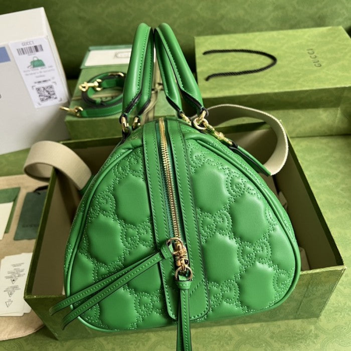 Gucci GG matelassé leather top handle bag green ý702242
