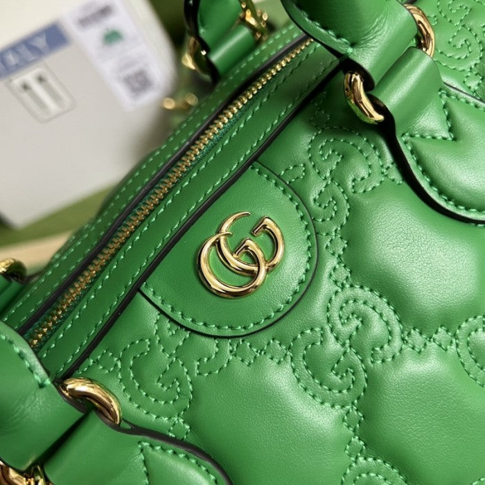 Gucci GG matelassé leather top handle bag green ý702242