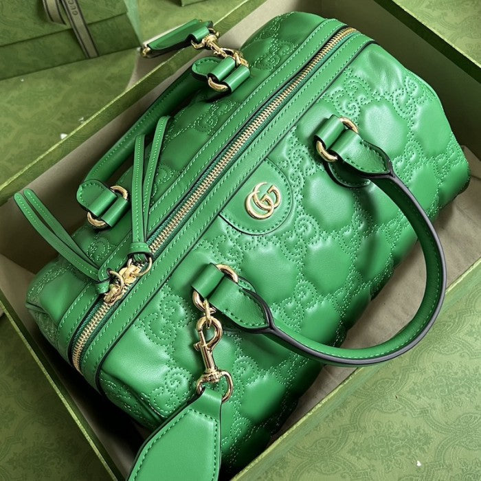 Gucci GG matelassé leather top handle bag green ý702242
